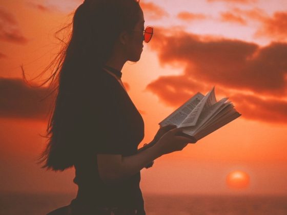 woman reading at dusk